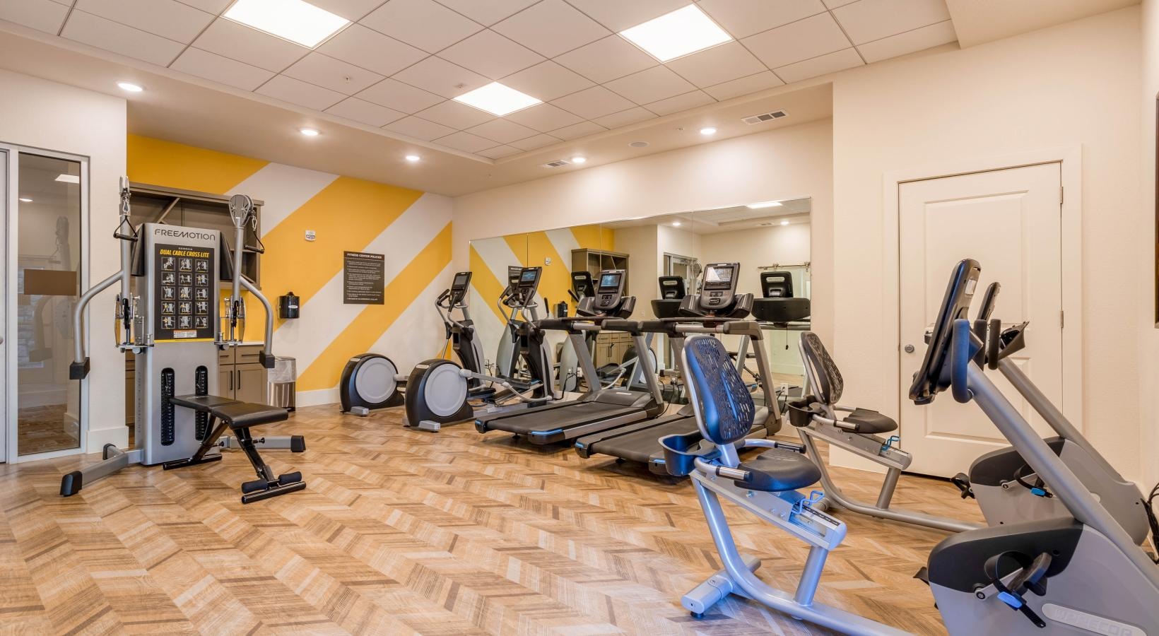 Get your workout on a gym with exercise equipment