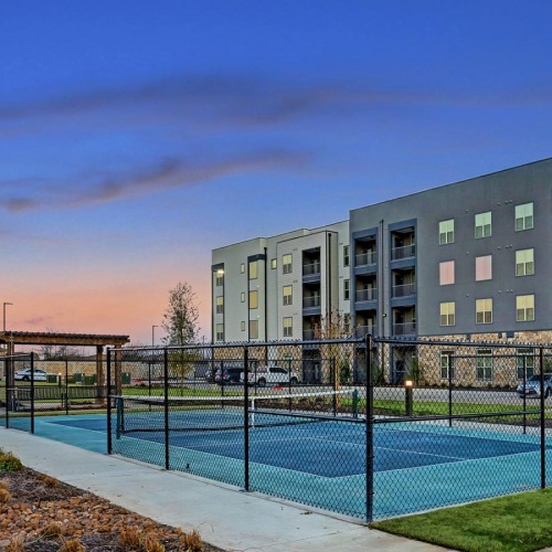 The essence of exceptional living a building with a fence in front