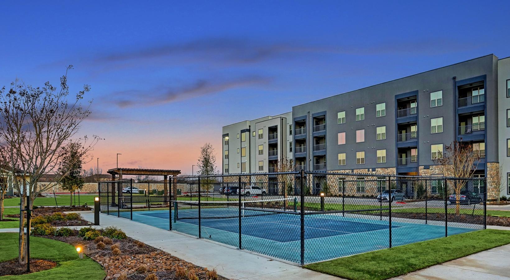 The essence of exceptional living a building with a fence in front